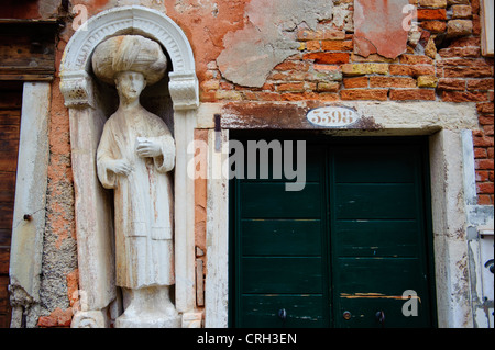 Statue of one of the Mastelli Bothers in Campo dei Mori, Venice, Veneto, Italy. Stock Photo