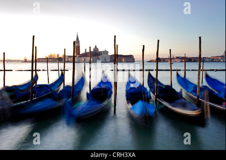 Gondolas moored in front of the Basilica of San Giorgio Maggiore, Venice, Veneto, Italy