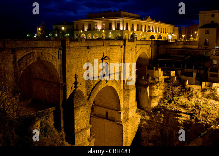 New Bridge (Spanish: Puente Nuevo) from 18th century illuminated at night in the town of Ronda, southern Andalusia, Spain. Stock Photo