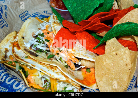 Fish tacos melted jack cheddar cheeses coloured corn tortilla chips cilantro Hangout Restaurant Stock Photo