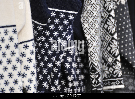 Traditional woolen jumpers in a market stall, Bergen, Norway Stock Photo