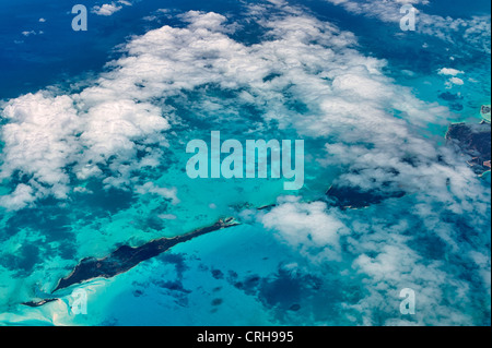 Aerial view of islands and clouds in the Bahamas.
