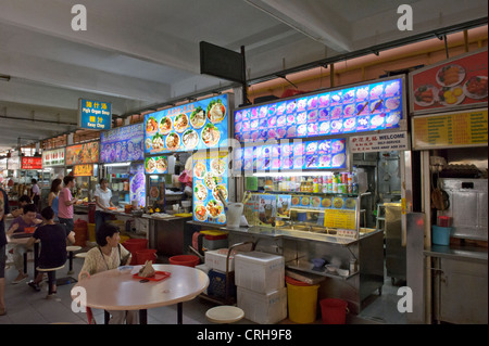 A traditional restaurant with seating areas with dinners, Food Court, Singapore. Stock Photo