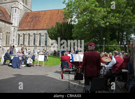 Band playing at a Fete in Ringwood Parish Church of St. Peter and St. Paul. Stock Photo