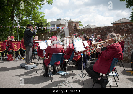 Band playing at a Fete in Ringwood Parish Church of St. Peter and St. Paul. Stock Photo