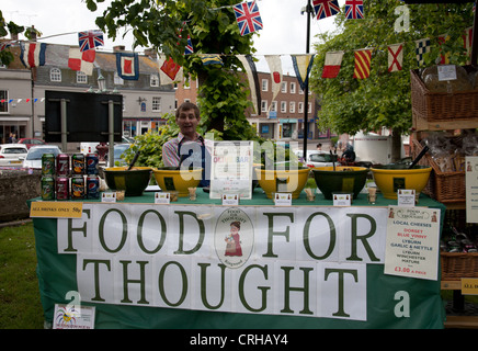 Food seller at a Fete in Ringwood Parish Church of St. Peter and St. Paul. Stock Photo