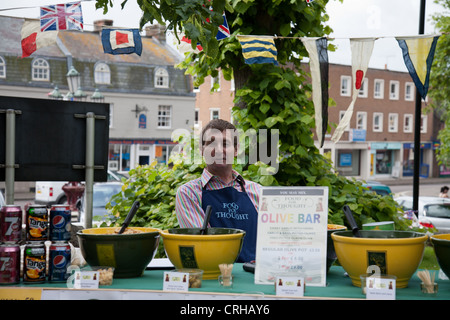 Food seller at a Fete in Ringwood Parish Church of St. Peter and St. Paul. Stock Photo