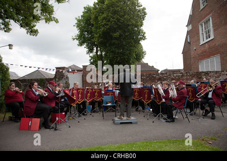 Band playing at a fete at Ringwood Parish Church of St. Peter and St. Paul, Stock Photo