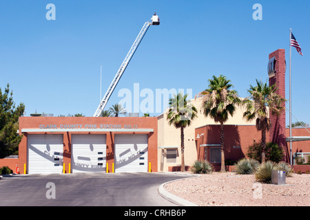 LAS VEGAS, NEVADA, USA - JUNE 17, 2012:  Exterior view of Clark County Fire Station 11 in Las Vegas with extended ladder with bucket Stock Photo
