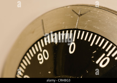 Closeup of a combination lock on a military-grade secure safe with the dial set to 0 Stock Photo