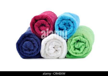 colorful rolled towels on white background Stock Photo