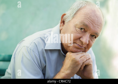 Seniors portrait of contemplative old caucasian man looking at camera. Copy space Stock Photo