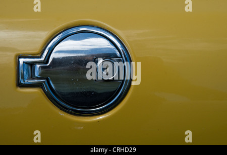 Stag Car petrol cap and logo on a yellow car. Stock Photo