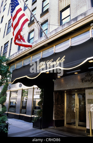 The Carlyle Hotel New York City on Madison Avenue. Exterior marquee view with American flag. USA Stock Photo