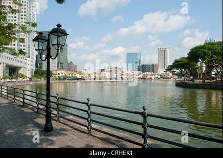 River promenade between Boat Quay and the Fullerton along the Singapore river in Singapore's city centre Stock Photo