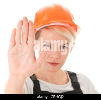 woman in work clothes show the stop signal Stock Photo