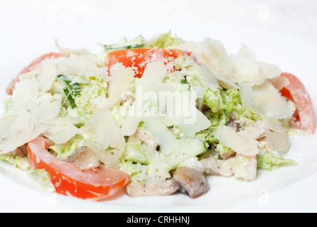 Salad with fresh Pekinese cabbage and tomatoes. Salad with fresh vegetables Stock Photo