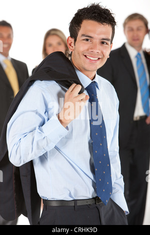 young confident businessman, with tie and jacket over his shoulder Stock Photo
