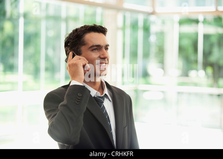 Businessman using cell phone Stock Photo