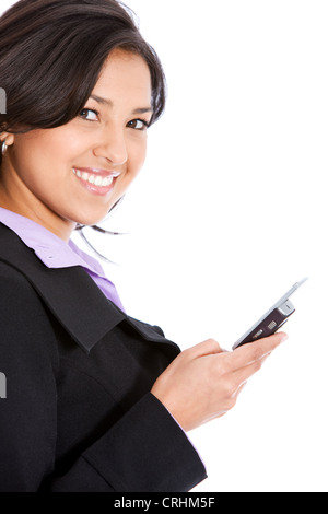business woman smiling and writing a SMS with her mobile Stock Photo