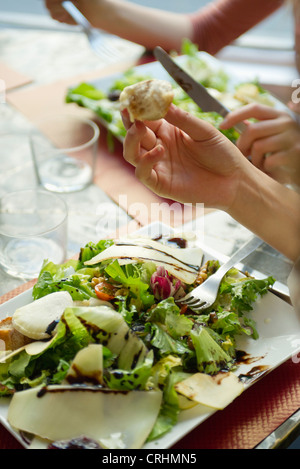 People enjoying healthy salad, cropped Stock Photo