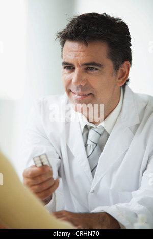 Doctor providing patient with prescription drugs Stock Photo
