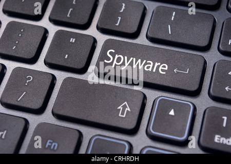 spyware concepts, with message on enter key of keyboard. Stock Photo