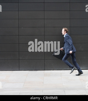 Business man running Stock Photo
