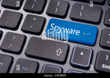 spyware concepts, with message on enter key of keyboard. Stock Photo