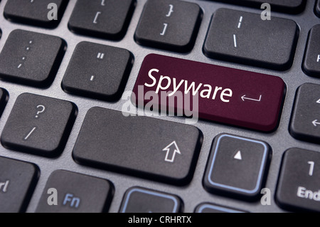 spyware concepts, with message on enter key of keyboard. Stock Photo