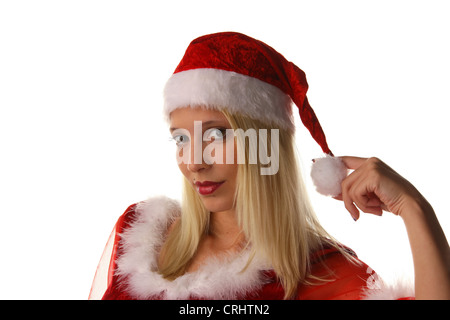 young attractive fair-haired Santarina with Santa cap, playing at her bobble Stock Photo