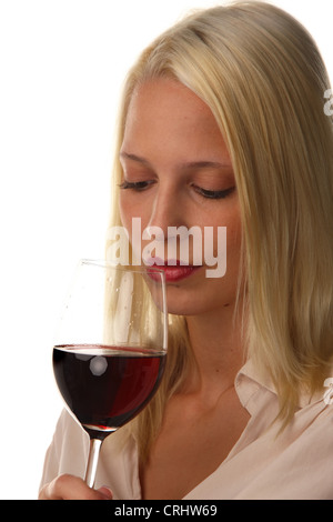 young attractive woman drinking a glass red wine Stock Photo