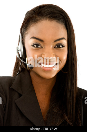 smiling young business woman wearing a headset Stock Photo