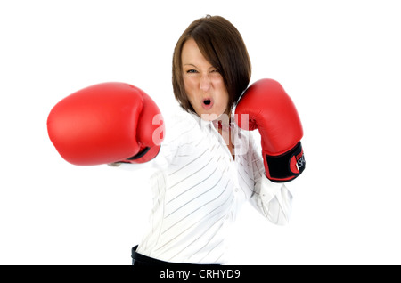 Portrait of confident young woman wearing red boxing gloves and