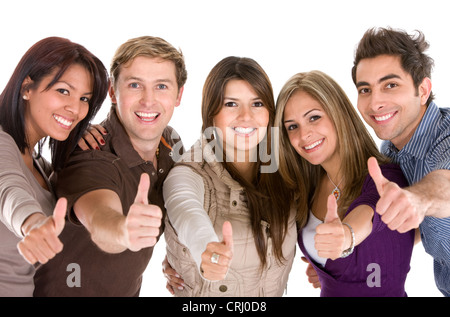 five young people thumbing up with a smile Stock Photo