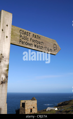A direction signpost on the south west coast path near Pendeen in Cornwall, UK Stock Photo