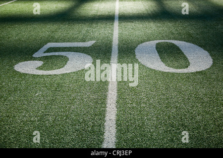 50 yard line marker in American Football stadium. Stock Photo