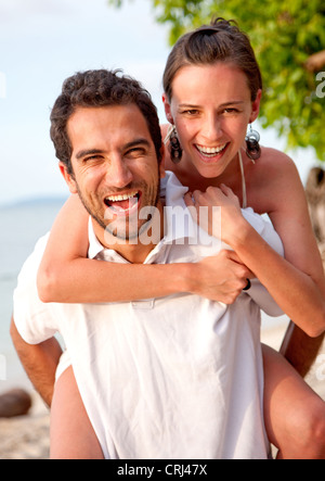 happy young beach couple smiling and having fun Stock Photo