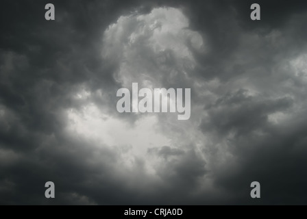 Gloomy clouds have shrouded the sky before a thunder-storm Stock Photo