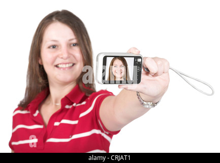 junges Maedchen praesentiert Selbstportraet auf dem Display ihrer Digitalkamera Stock Photo