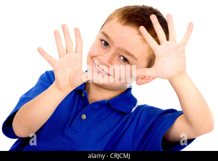 cute boy smiling doing the hand frame Stock Photo