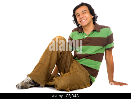casual guy on the floor with a big smile Stock Photo