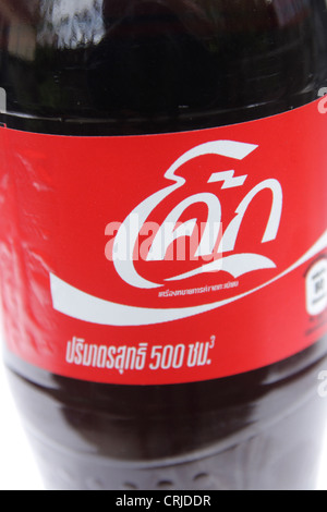 Thai Coke logo on bottle . Stock Photo