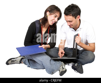 casual students on the floor learning and flirting Stock Photo