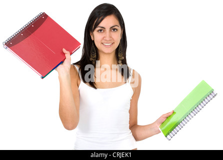 college student smiling and holding notebooks Stock Photo