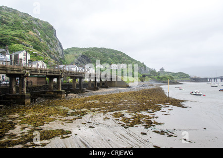 BARMOUTH, Wales - The waterfront at low tide next to The Quay in Barmouth (Abermaw), Wales, during a rain and wind storm. Stock Photo