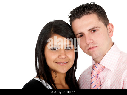 young couple smiling and standing next to each other Stock Photo
