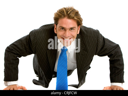 Business man doing push-ups Stock Photo