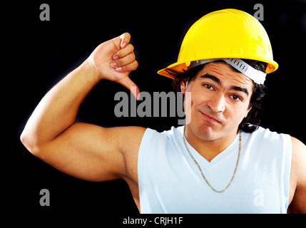 male builder or constructor giving the thumbs down Stock Photo