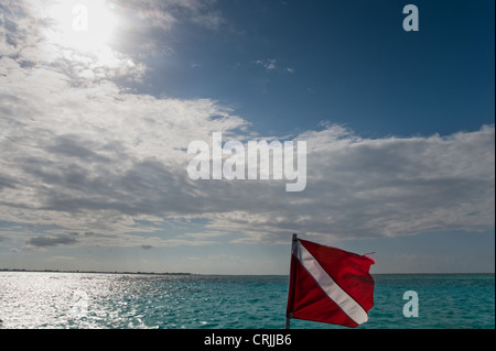 Diver down flag and sky, Grand Cayman Stock Photo